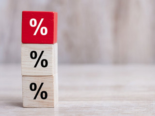 wood cube block with percentage symbol icon. Interest rate, fin