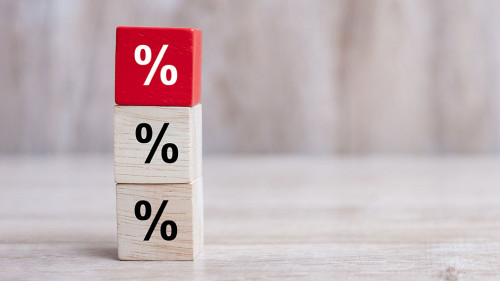 wood cube block with percentage symbol icon. Interest rate, fin