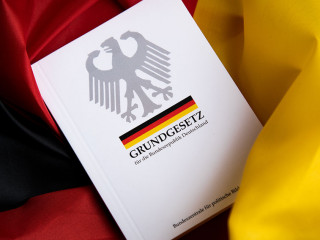 The book of German constitution basic law on flag of federal republic of Germany