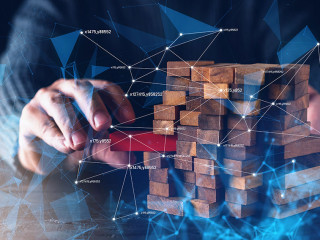 business man hand built structure wood block with virtual line c