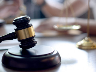 Lawyer or judge gavel with balance handshake