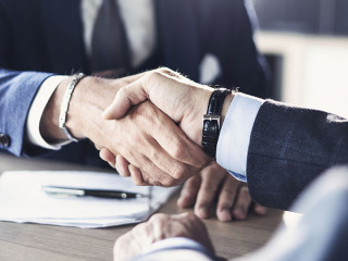 Business partnership meeting in office