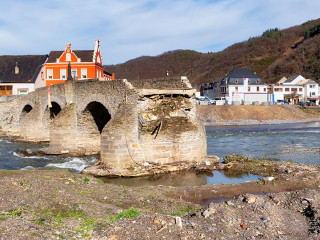 Flood damage in Ahrtal and Eifel. Reconstruction after cleanup. Nepomukbrücke in Rech, Germany