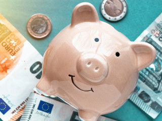 piggy bank concept isolated on blue background