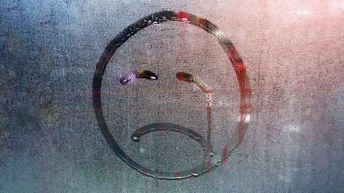 Sad smiley of raindrops