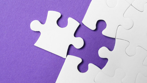 White puzzle with unfitting piece on purple background, flat lay