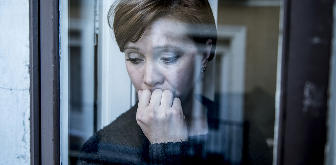 dramatic close up portrait of young beautiful woman thinking and