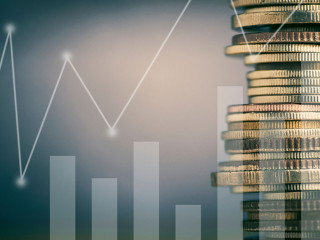 Stacked of coin money with account book finance and banking conc