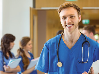 Medical student smiling at the camera