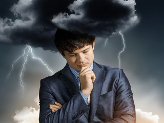 Stressed businessman concept . Mixed media