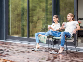 Couple on the terrace of the modern house