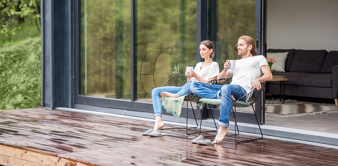 Couple on the terrace of the modern house
