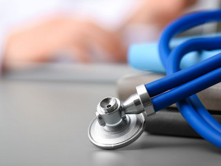 Medical students stuff on table against blurred background. Spac