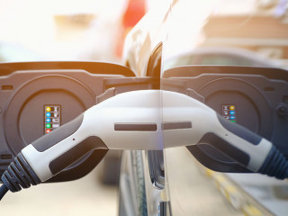 Charging modern electric car battery on the street which are the