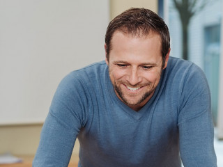 Happy successful young businessman