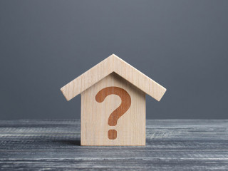 House with a question mark. Cost estimate. Solving housing problems, deciding buy or rent real estate. Search for options, choice type of residential buildings. Property price valuation evaluation