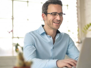 Successful businessman working with his laptop