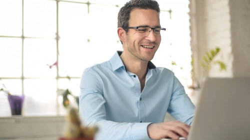 Successful businessman working with his laptop