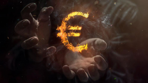 Burning symbol of euro with man in the background. Conception of risk management in money trading at currency market