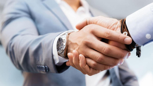 Handshake of businessmenoncepts - soft focus