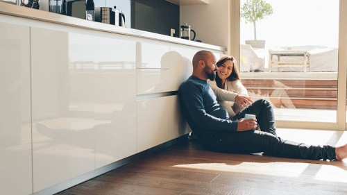 Loving young couple spending time together at home