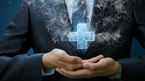 Businessman shows a hologram plus .