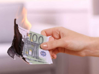 Woman burning Euros in the room