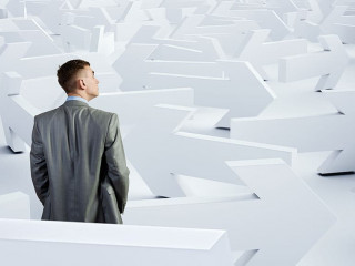 Businessman choosing his business direction