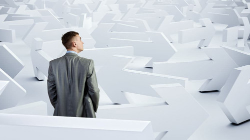 Businessman choosing his business direction