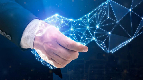 Businessperson shaking hand with digital partner over futuristic