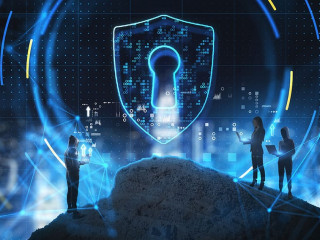 Abstract people on mountain using laptops with glowing security shiled on blurry city background. Secure, safety and digital protection concept. Double exposure.