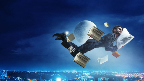 Joyful happe businessman levitating horizontally