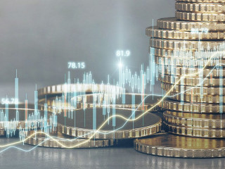 Abstract glowing candlestick forex chart on blurry golden coins wallpaper. Money, economy and finance concept. Double exposure.