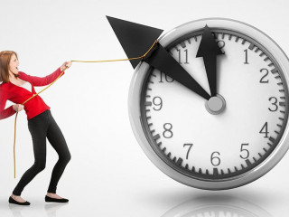 Woman pulling clock hands backwards