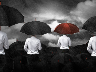 Man in white standing umbrella business concept.