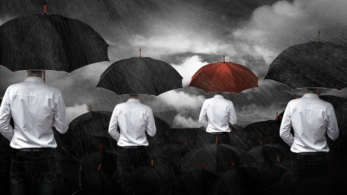 Man in white standing umbrella business concept.