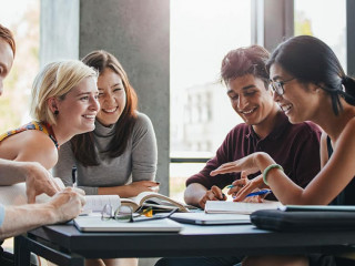 Students studying in college library
