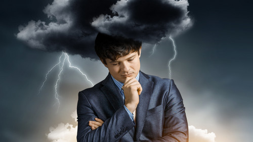 Stressed businessman concept . Mixed media