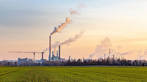 industry complex in Frankfurt in late evening with fields and s
