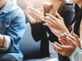 Business people applauding.