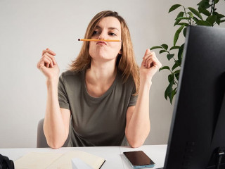 Woman procrastinate at home workplace. Remote work and home office problem