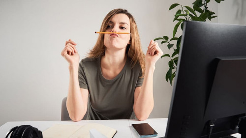 Woman procrastinate at home workplace. Remote work and home office problem