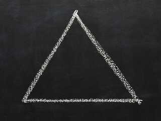 Triangle drawn with chalk on blackboard