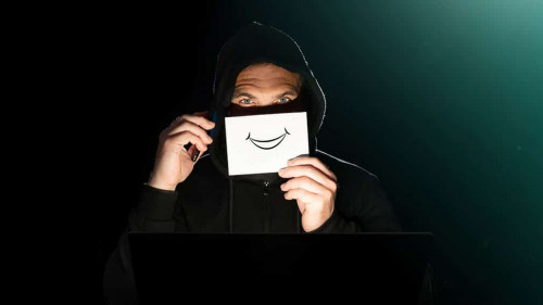 Cyber fraudster telephoning his victim and hiding behind a pleas