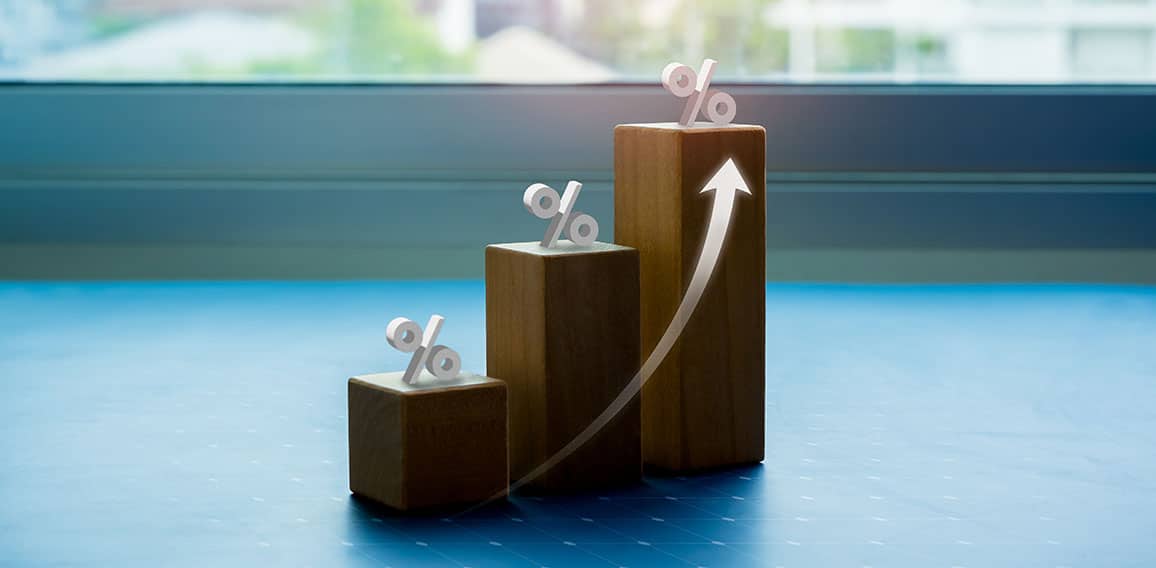 Shining rise up arrow on wooden cube blocks, bar graph chart ste