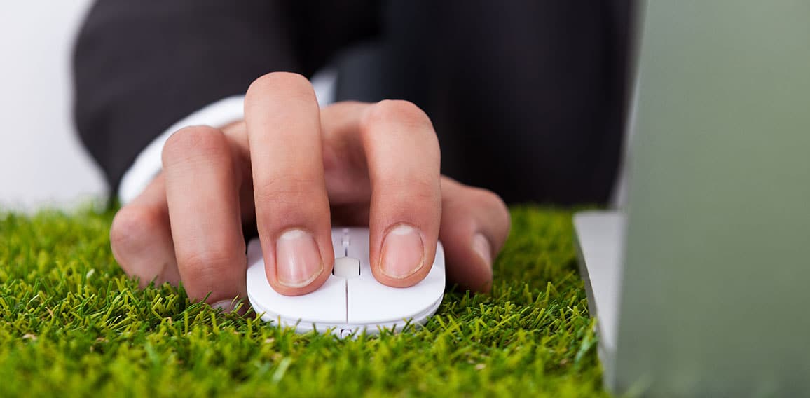 Businessman Using Laptop With Computer Mouse