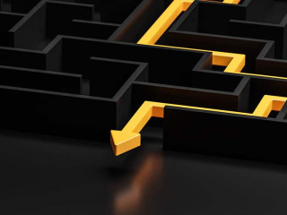 3d rendering: Concept - solving a complex problem. Black maze and floor with yellow solution path with arrow. Low key image.
