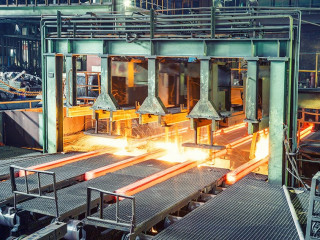 hot steel on conveyor in steel plant