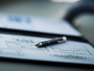 Drawings and charts of successful business.