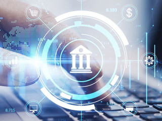 Close up of hands using laptop keyboard on desktop with creative online banking hologram on blurry background. Technology, fintech and finance concept. Double exposure.